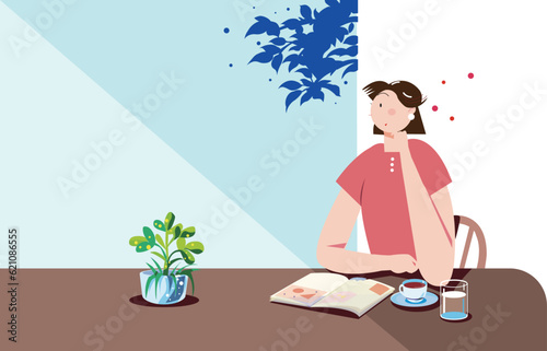 カフェでコーヒーをを飲みながら雑誌を読んだりして、くつろぐ女性