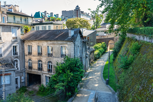 Fototapeta Naklejka Na Ścianę i Meble -  Narrow streets next to old buildings of the medieval city of Pau next to the Pyrenees, France.