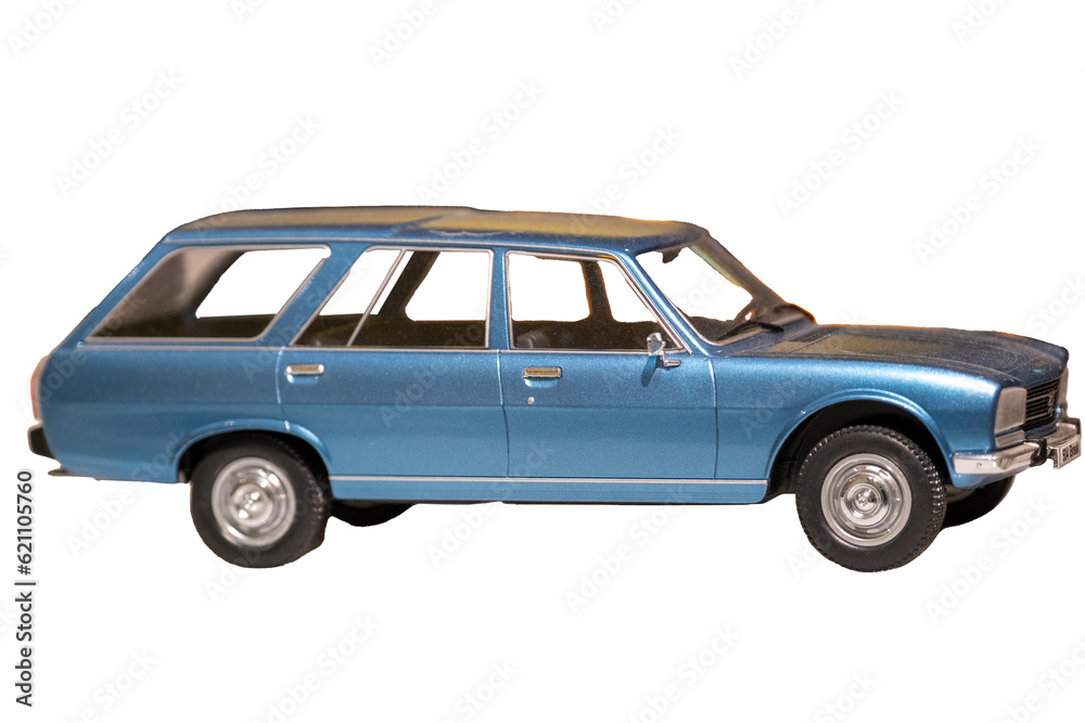 Image of an old, vintage blue station wagon scale model car isolated on white with a clipping path. Selective focus