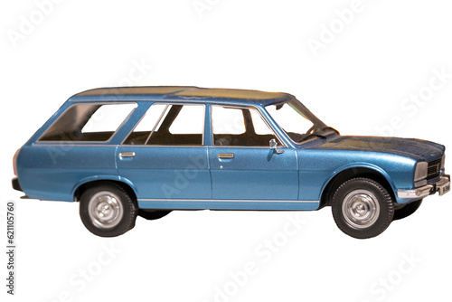 Fototapeta Naklejka Na Ścianę i Meble -  Image of an old, vintage blue station wagon scale model car isolated on white with a clipping path. Selective focus