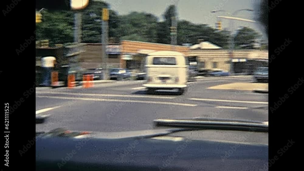 New York, United States of America - circa 1970: point of view tourist of driving car across New York city traffic in 70's. Vintage cars on the road.
