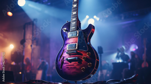 Close-up of electric guitar on a stand on stage