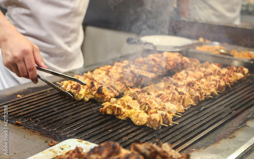 
meat and chicken dishes on the grill