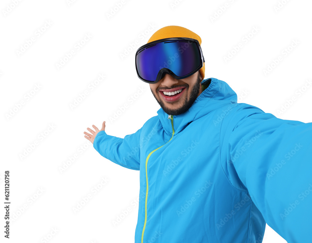 Smiling young man in ski goggles taking selfie on white background Smiling young man in ski goggles taking selfie on white background