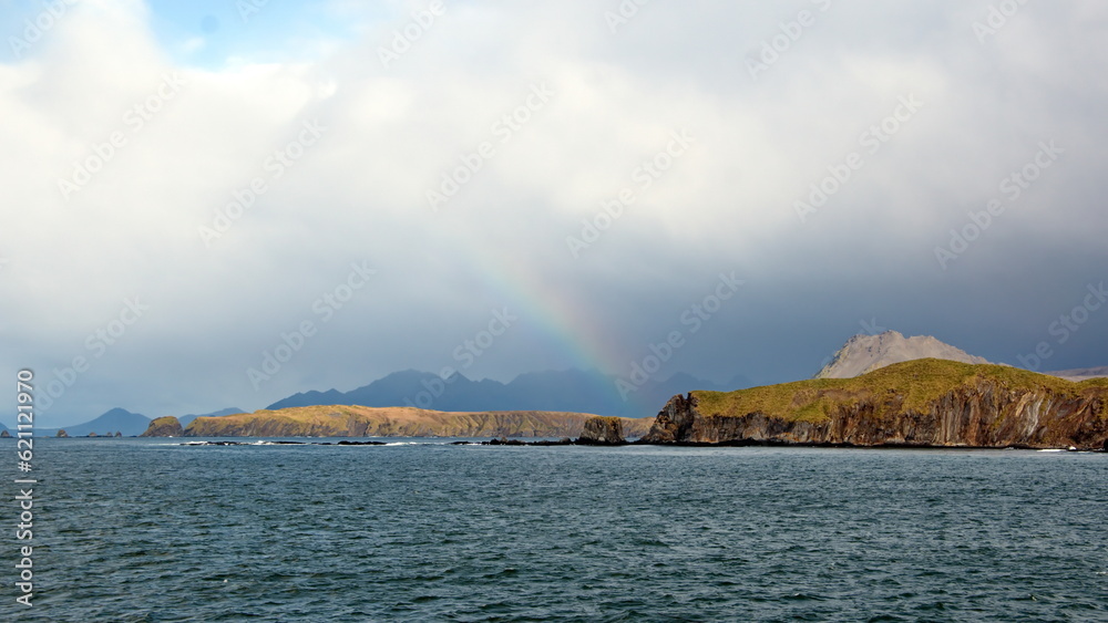 Rainbow above the coast at Ocean Harbor, South Georgia Island Rainbow above the coast at Ocean Harbor, South Georgia Island