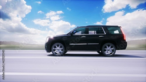 big black luxury car on highway. Very fast driving. photo