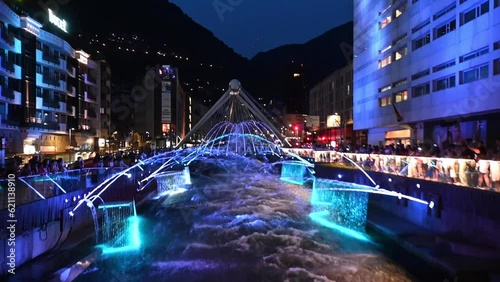 Andorra La Vella, Andorra : 2023 July 7 : Light and water show in the Capital of Andorra on the Valira River in Andorra La Vella in 2023.