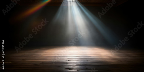 Spotlight with bright light on dark wood floor © tashechka