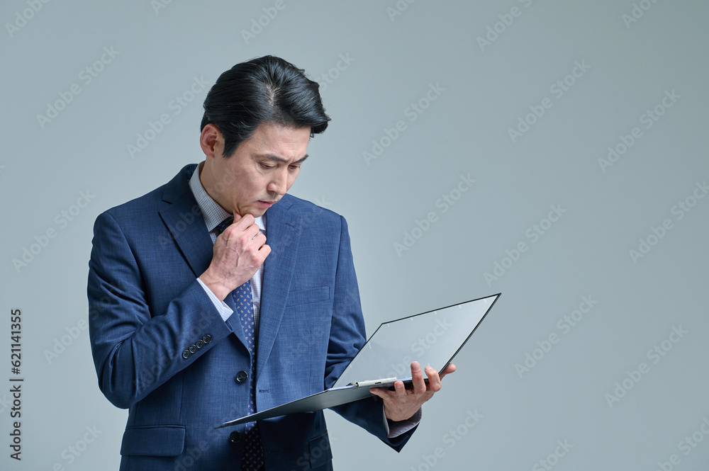 Middle-aged office worker with glasses and files, various expressions of emotions Middle-aged office worker with glasses and files, various expressions of emotions