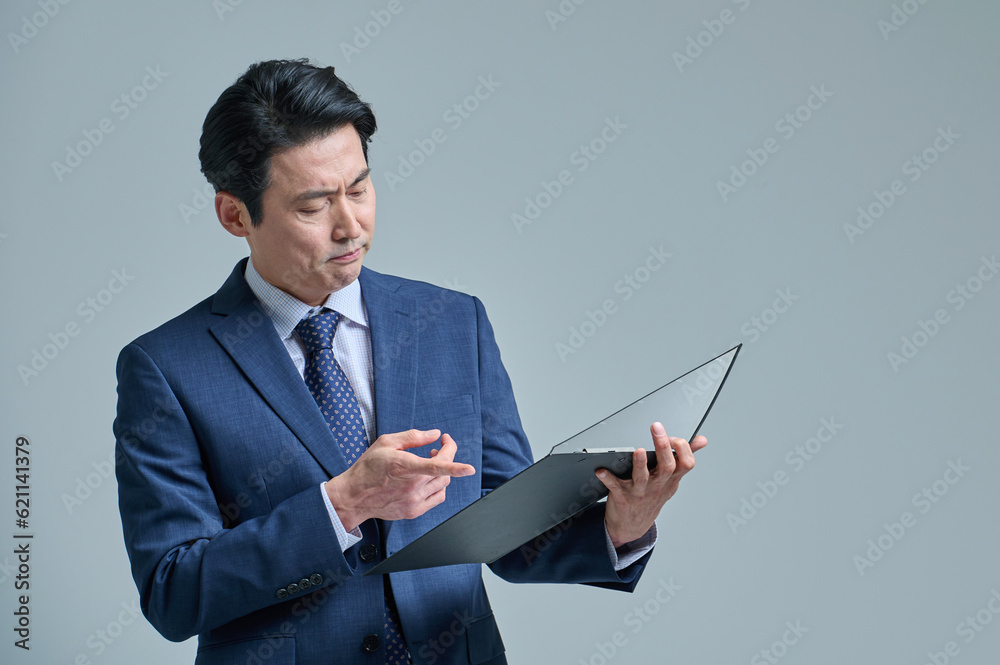 Middle-aged office worker with glasses and files, various expressions of emotions Middle-aged office worker with glasses and files, various expressions of emotions