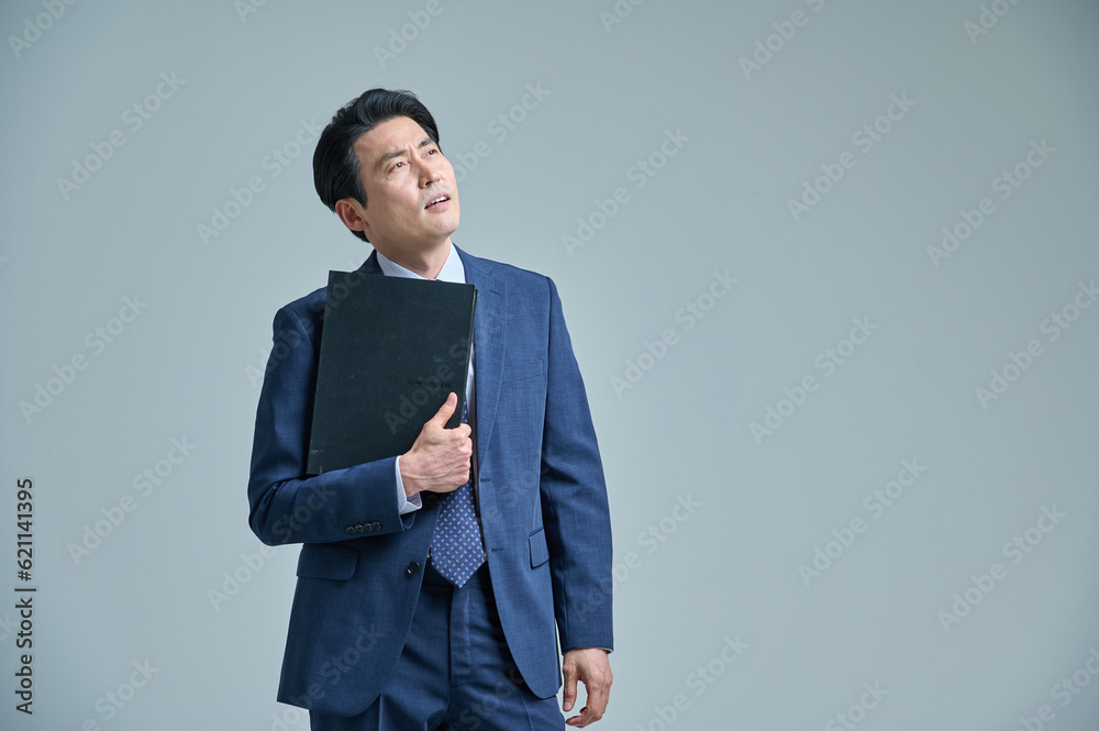 Middle-aged office worker with glasses and files, various expressions of emotions Middle-aged office worker with glasses and files, various expressions of emotions