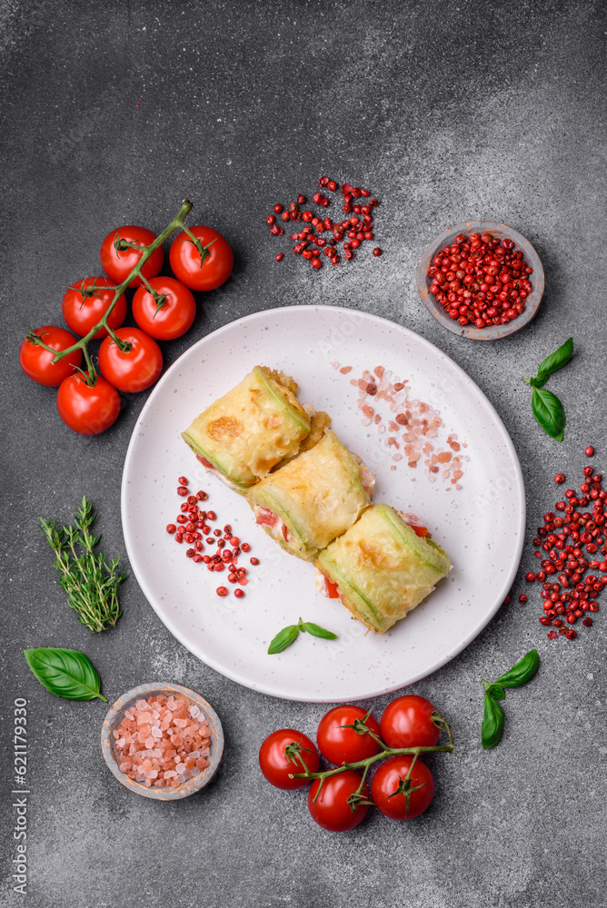 Delicious healthy vegetarian vegetable roll of zucchini, tomatoes, peppers and sauce Delicious healthy vegetarian vegetable roll of zucchini, tomatoes, peppers and sauce