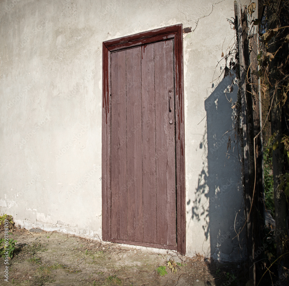 Old wooden door to a vintage dwelling