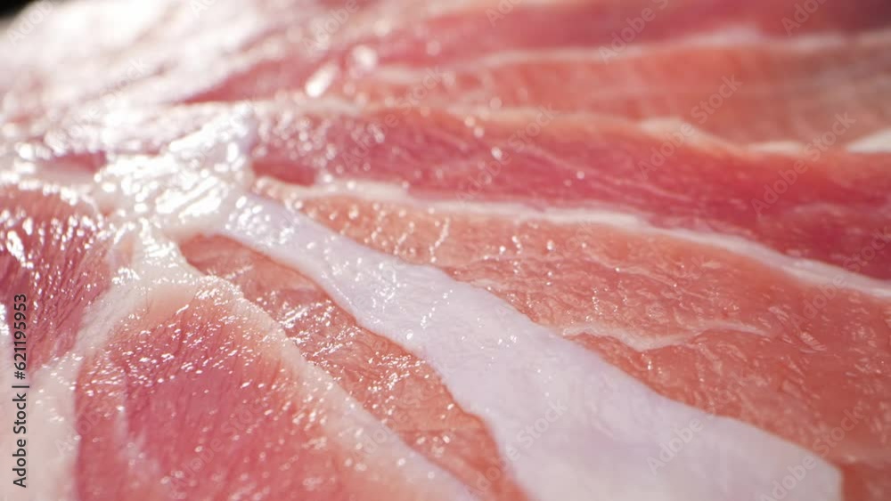 With the macro lens, you can appreciate the intricate details of the pork belly slice. The meat fibers are visible, showing the delicate striations that contribute to its succulent texture. 4K UHD
With the macro lens, you can appreciate the intricate details of the pork belly slice. The meat fibers are visible, showing the delicate striations that contribute to its succulent texture. 4K UHD