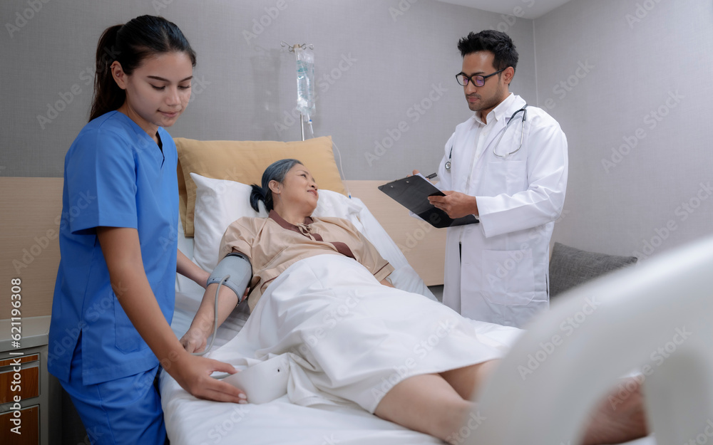 Fototapeta premium Doctors and nurses helping and caring for old people at nursing homes.