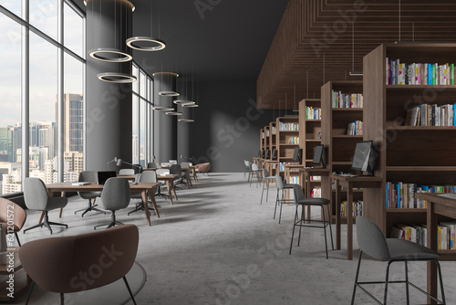 Photography Modern library interior with table and chairs in row, bookshelf and window