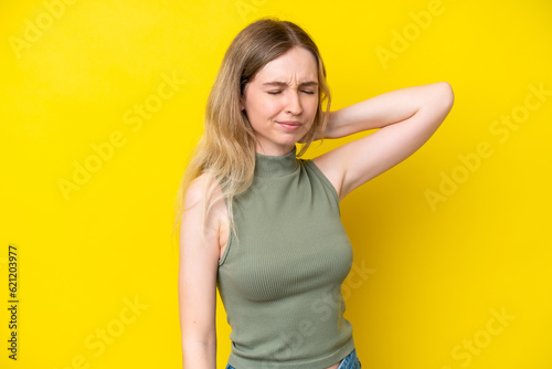 Blonde English young girl isolated on yellow background with neckache