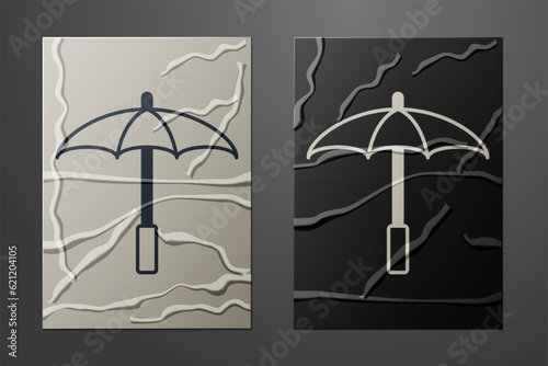 White Sun protective umbrella for beach icon isolated on crumpled paper background. Large parasol for outdoor space. Beach umbrella. Paper art style. Vector