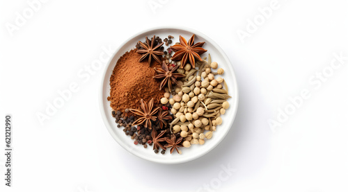 mixed spices in a wooden bowl isolated on white, top view, mixed cardamom and starnies