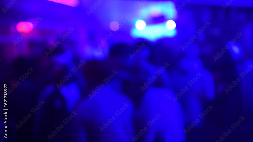 Defocused background of people dancing at a party. Party concept. Defocused background of people dancing at a party. Party concept.