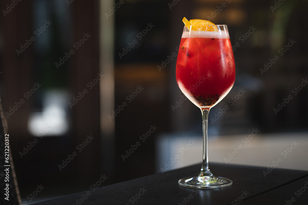 Cocktail on a dark background. Party drink. Alcoholic drink.