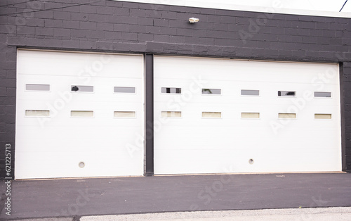 Wallpaper Mural garage door stands as a gateway of privacy and utility, symbolizing security, shelter, and the hidden narratives within a home Torontodigital.ca