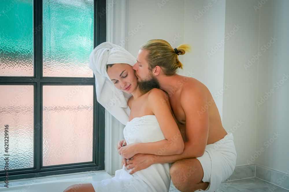 Romantic young couple enjoying and relaxing in the bathtub Romantic young couple enjoying and relaxing in the bathtub