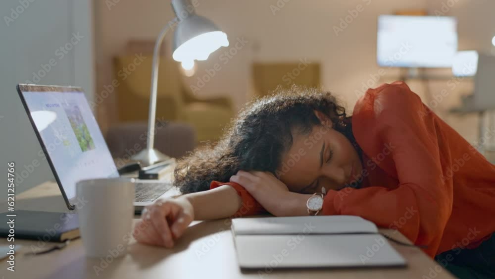 Tired, sleeping and woman, computer and night for fatigue, time management and and mental health risk. Business person or employee with career dream or depression on laptop, notebook and job deadline Tired, sleeping and woman, computer and night for fatigue, time management and and mental health risk. Business person or employee with career dream or depression on laptop, notebook and job deadline