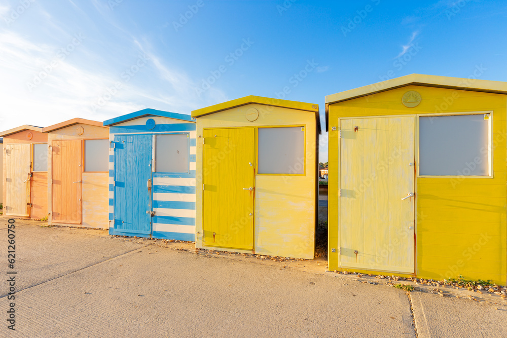 Colourful beach huts in a row. Seaford, East Sussex Colourful beach huts in a row. Seaford, East Sussex