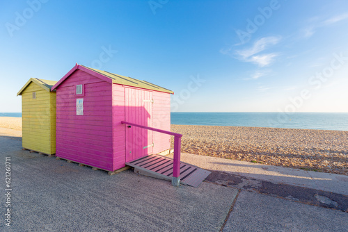 Colourful beach huts in a row. Seaford, East Sussex © Falk