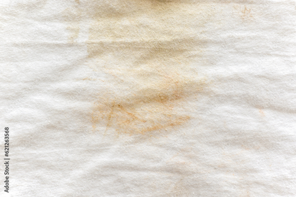 Obraz premium Dirty white cotton fabric. Stains on shirt. Dirty clothes texture background. 