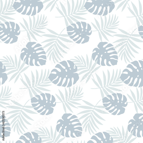 Tropical seamless pattern with blue palm branches and monstera leaves on a white background. Pattern for textiles, wrapping paper, wallpapers, covers, backgrounds