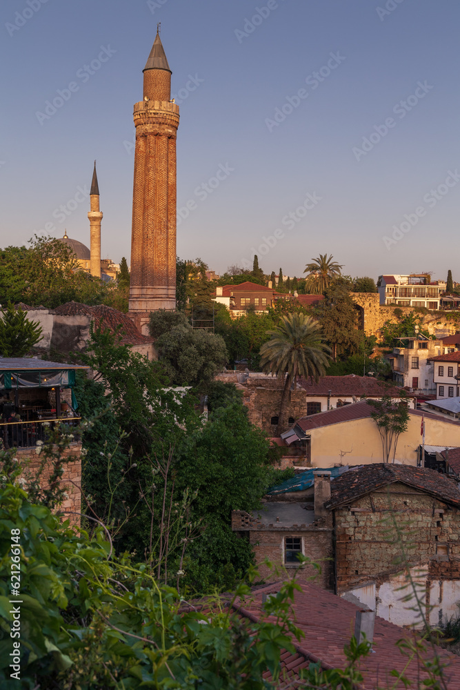 Cityscape with architectural symbol, ancient Yivli Minare Cami or Fluted Minaret, Antalya, Turkey