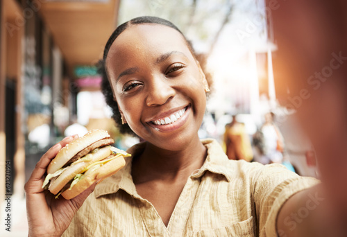 Burger  portrait and woman in selfie  city and restaurant outdoor promotion  social media and live streaming review. Fast food  happy face and african person or influencer on sidewalk for photography