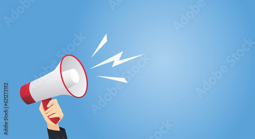 Hand holding megaphone on blue background vector illustration