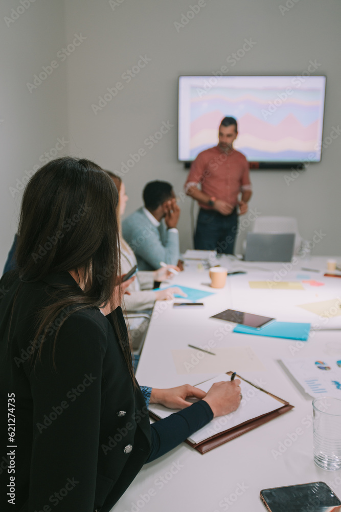Fototapeta premium Business woman writing notes