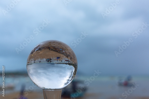 .raining on crystal balls beside the beach. .Nature image raining background in nature and travel concept.