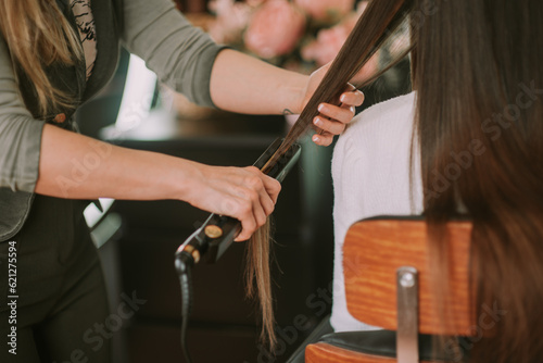 Combing hair. Close up photo