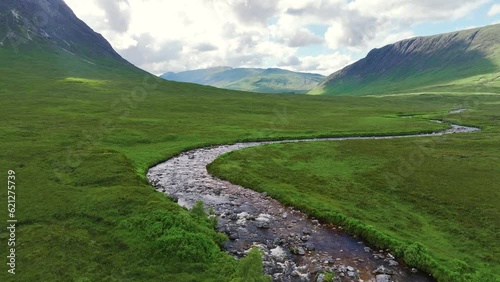 Buachaille Etive Mòr and Waterfall from a drone, River Coupall, Glen Etive and River Etive, Highlands, Scotland, UK photo