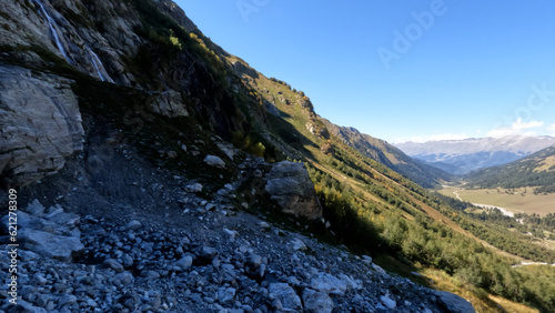 mountain landscape, image of Arkhyz mountain ridge at autumn with blue sky - photo of nature