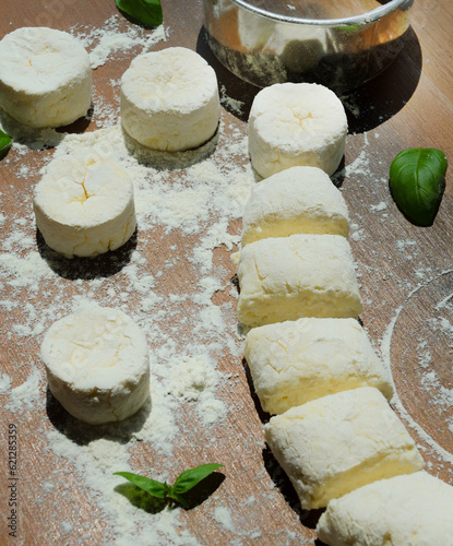 Homemade cheesecakes are ready for baking. photo