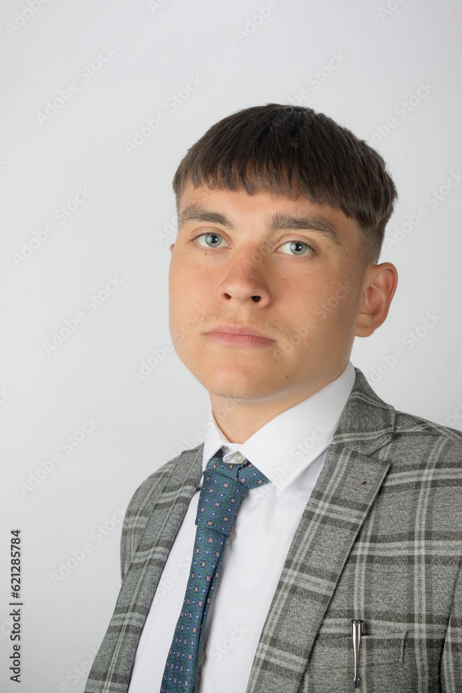 Young entrepreneur wearing a suit and tie looking worried Young entrepreneur wearing a suit and tie looking worried