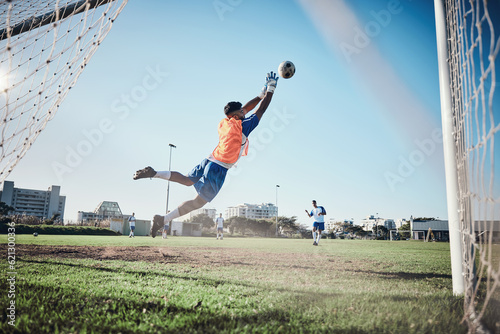 Bild auf Leinwand Fitness, goalkeeper or soccer player taking a penalty in a game or training match at a tournament