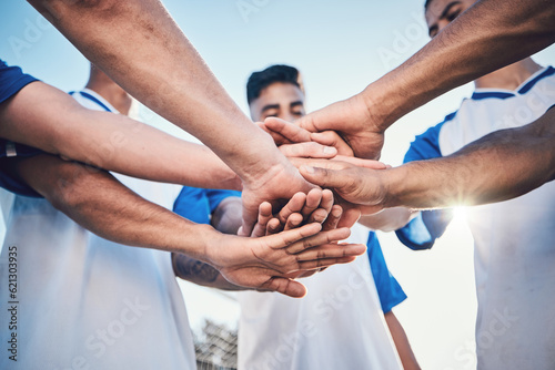 Fototapeta Naklejka Na Ścianę i Meble -  Soccer, hands together and teamwork, support and sports for training at stadium. Collaboration, group huddle and football players with motivation for exercise, workout goal or success in competition