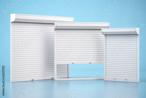 Window roller shutters of different size on blue background.