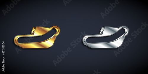 Gold and silver Inflatable boat with outboard motor icon isolated on black background. Long shadow style. Vector