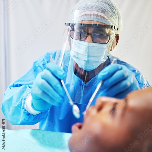 Dentist  consultation and man check patient mouth  dental healthcare and medical procedure at clinic. PPE  dentistry and orthodontics treatment  male person with oral care tools and teeth whitening