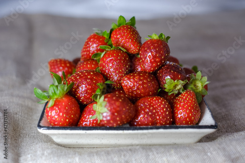 Juicy strawberries on a plate