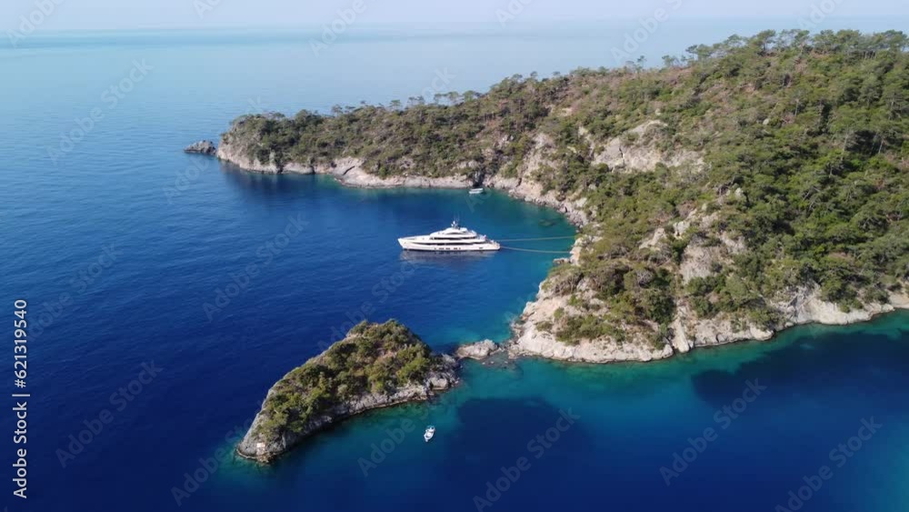 Drone aerial view of luxury private yacht in the mediterranean azure sea at sunny summer day Drone aerial view of luxury private yacht in the mediterranean azure sea at sunny summer day