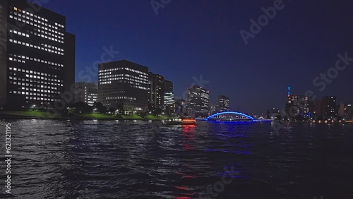 Night light Tokyo, Tsukuda, Toyosu skyscrapers and bridge the Sumida River Yakatabune, pleasure boat